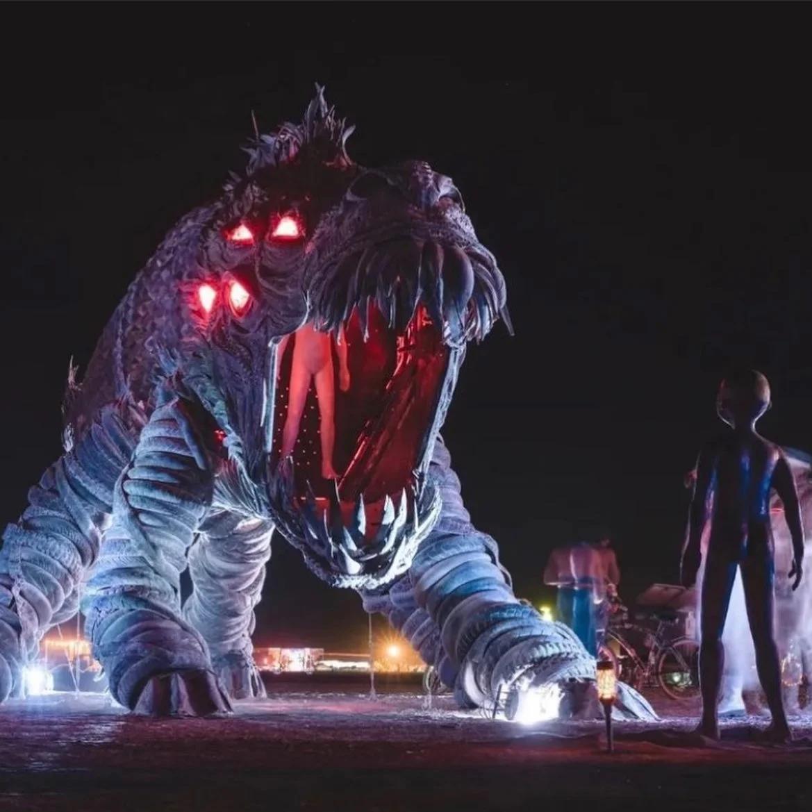The Fearbeast's glowing eyes and open mouth confronting visitors at night
